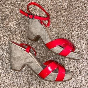 Red wedge pumps
